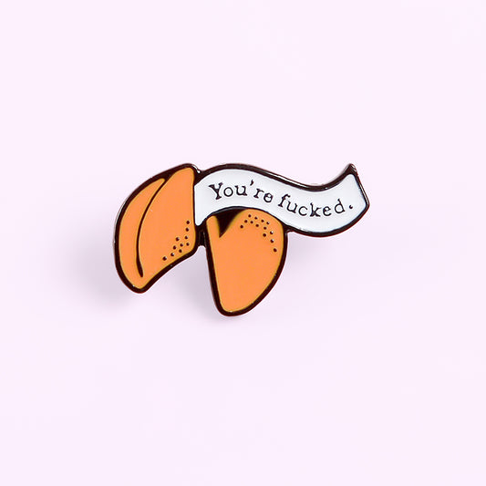 Enamel pin with cartoon fortune cookie dripping oil
